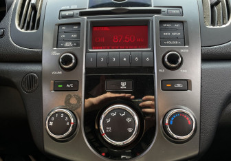 Подержанный автомобиль Kia Cerato Sedan 2010 года (14 фото)