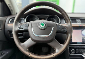 Подержанный автомобиль Skoda Superb Wagon 2012 года (12 фото)