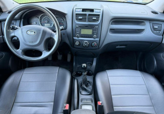 Подержанный автомобиль Kia Sportage 2009 года (11 фото)