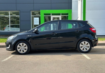 Подержанный автомобиль Kia Rio Hatchback 2015 года (8 фото)
