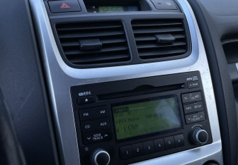 Подержанный автомобиль Kia Sportage 2009 года (12 фото)