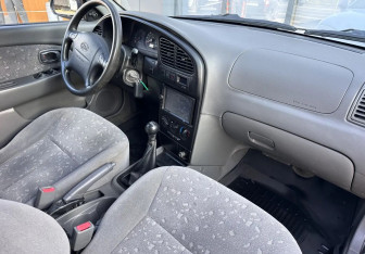 Подержанный автомобиль Kia Spectra Sedan 2008 года (10 фото)