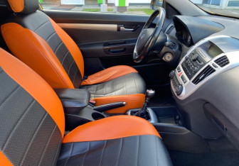 Подержанный автомобиль Kia Ceed Hatchback 2009 года (10 фото)