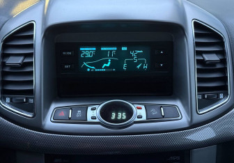 Подержанный автомобиль Chevrolet Captiva 2013 года (15 фото)