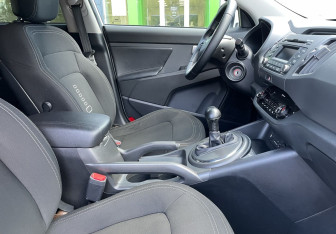 Подержанный автомобиль Kia Sportage 2012 года (9 фото)