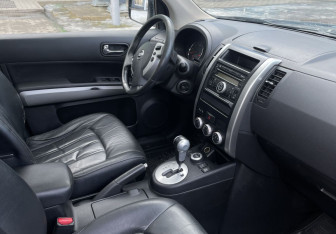 Подержанный автомобиль Nissan X-Trail 2011 года (10 фото)