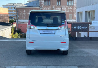 Подержанный автомобиль Suzuki Solio 2017 года (6 фото)