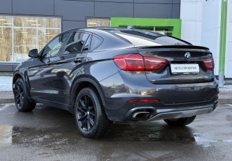 Подержанный автомобиль BMW X6 2016 года (7 фото)