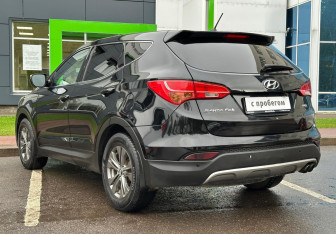 Подержанный автомобиль Hyundai Santa Fe 2012 года (7 фото)