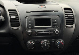 Подержанный автомобиль Kia Cerato Sedan 2013 года (13 фото)