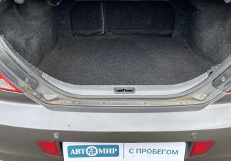 Подержанный автомобиль Kia Spectra Sedan 2006 года (17 фото)
