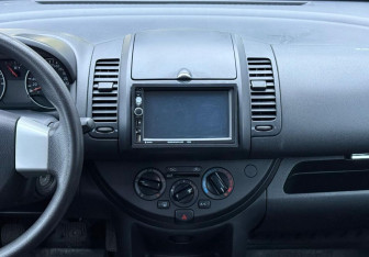 Подержанный автомобиль Nissan Note 2010 года (13 фото)