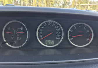 Подержанный автомобиль Nissan Primera Sedan 2003 года (12 фото)