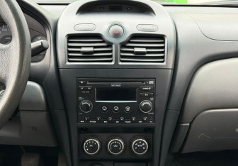 Подержанный автомобиль Nissan Almera Classic 2011 года (14 фото)