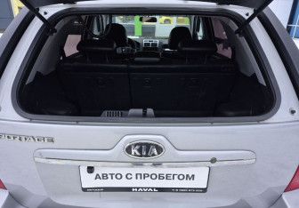 Подержанный автомобиль Kia Sportage 2007 года (18 фото)