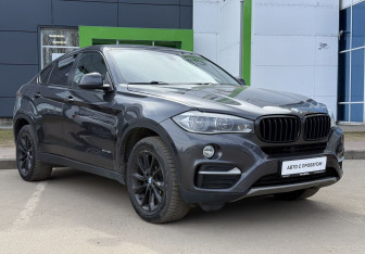 Подержанный автомобиль BMW X6 2016 года (3 фото)