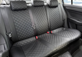 Подержанный автомобиль Skoda Rapid Liftback 2014 года (11 фото)