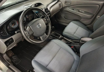 Подержанный автомобиль Nissan Almera Classic 2011 года (10 фото)