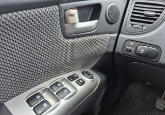 Подержанный автомобиль Kia Sportage 2010 года (14 фото)