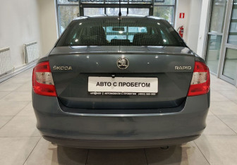 Подержанный автомобиль Skoda Rapid Liftback 2014 года (5 фото)