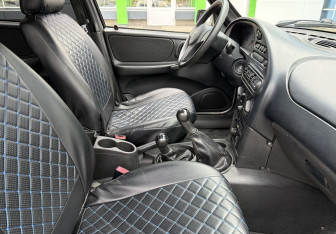 Подержанный автомобиль Chevrolet Niva 2015 года (9 фото)