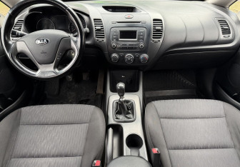 Подержанный автомобиль Kia Cerato Sedan 2013 года (9 фото)