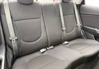 Подержанный автомобиль Kia Rio Sedan 2015 года (10 фото)