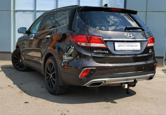 Подержанный автомобиль Hyundai Santa Fe 2016 года (8 фото)