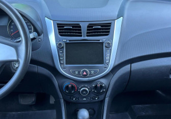 Подержанный автомобиль Hyundai Solaris Sedan 2014 года (13 фото)