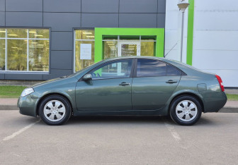 Подержанный автомобиль Nissan Primera Sedan 2003 года (8 фото)