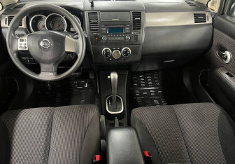 Подержанный автомобиль Nissan Tiida Hatchback 2013 года (11 фото)