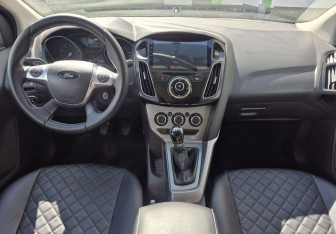 Подержанный автомобиль Ford Focus Hatchback 2011 года (11 фото)