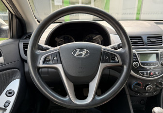 Подержанный автомобиль Hyundai Solaris Sedan 2013 года (14 фото)
