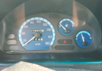Подержанный автомобиль Daewoo Matiz 2013 года (13 фото)