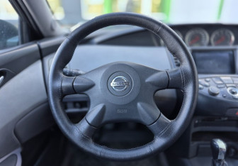 Подержанный автомобиль Nissan Primera Sedan 2003 года (13 фото)