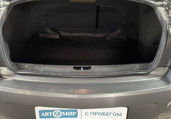 Подержанный автомобиль Opel Astra Sedan 2011 года (17 фото)