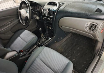 Подержанный автомобиль Nissan Almera Classic 2011 года (11 фото)