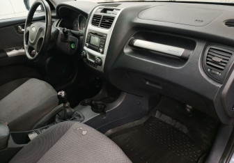 Подержанный автомобиль Kia Sportage 2009 года (11 фото)