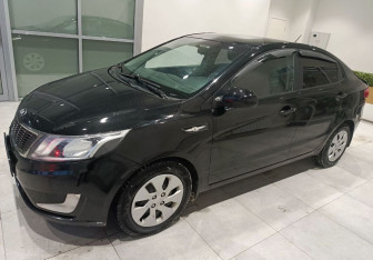 Подержанный автомобиль Kia Rio Sedan 2013 года (5 фото)