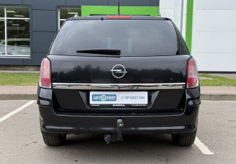 Подержанный автомобиль Opel Astra Wagon 2010 года (6 фото)