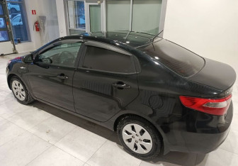 Подержанный автомобиль Kia Rio Sedan 2013 года (10 фото)
