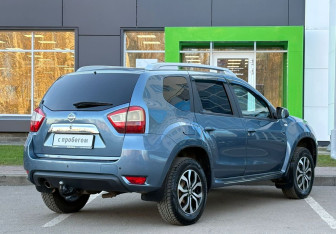 Подержанный автомобиль Nissan Terrano 2014 года (5 фото)
