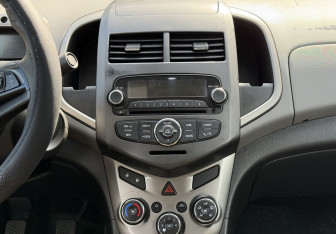 Подержанный автомобиль Chevrolet Aveo Sedan 2013 года (13 фото)