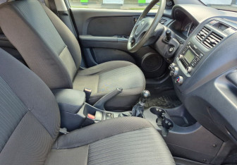 Подержанный автомобиль Kia Sportage 2010 года (10 фото)