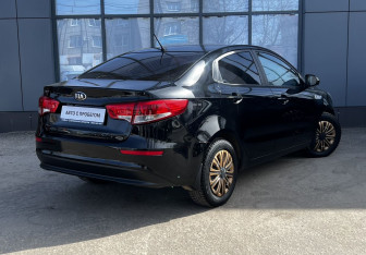 Подержанный автомобиль Kia Rio Sedan 2015 года (6 фото)