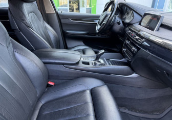 Подержанный автомобиль BMW X6 2016 года (10 фото)