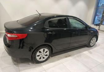 Подержанный автомобиль Kia Rio Sedan 2013 года (6 фото)