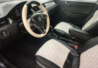 Подержанный автомобиль Skoda Rapid Liftback 2014 года (8 фото)