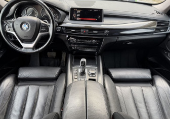 Подержанный автомобиль BMW X6 2016 года (9 фото)