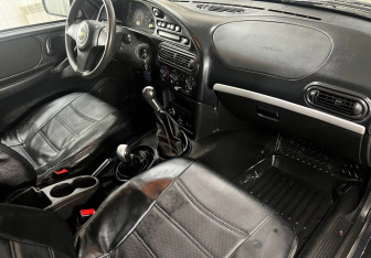 Подержанный автомобиль Chevrolet Niva 2013 года (12 фото)